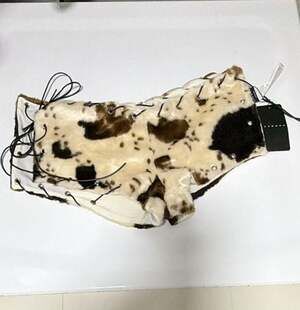 SUMWON Faux Fur Cow Print Lace-Up Shorts